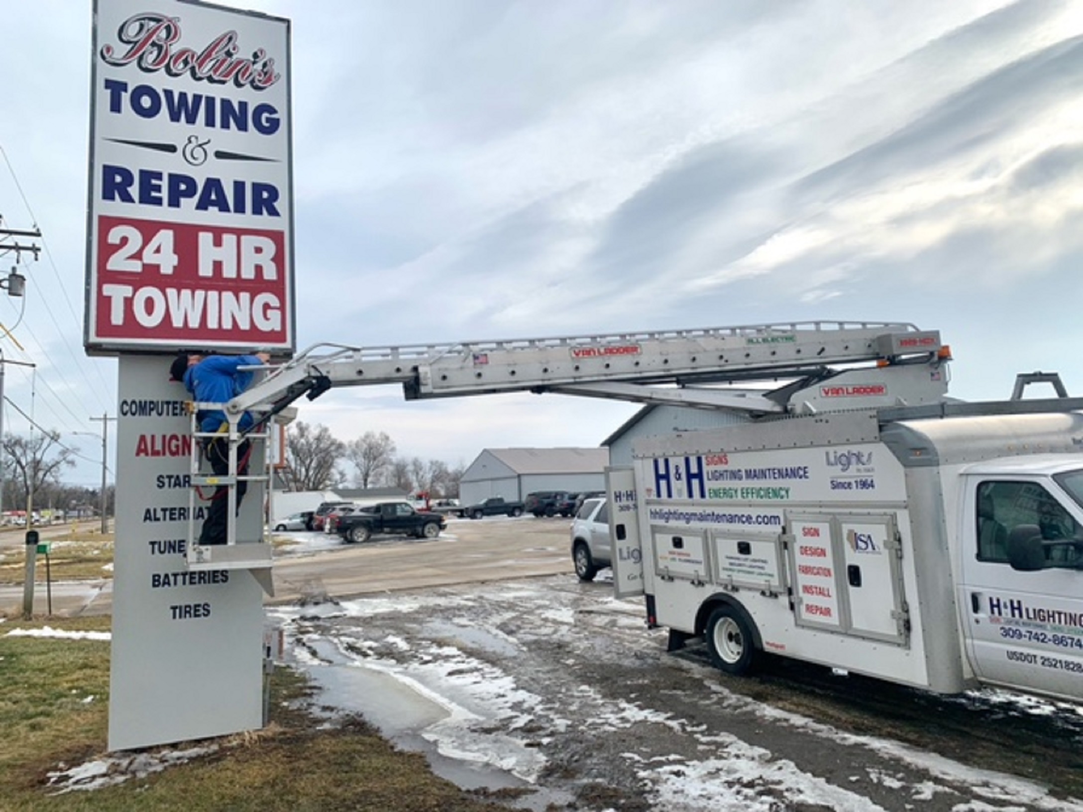 Brightening Bolin's Towing and Repair sign