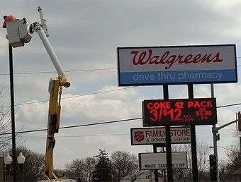 Upgrading a pole light to LED in Walgreens parking lot