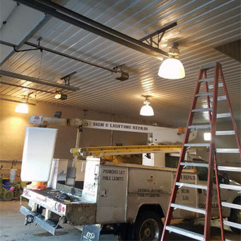 Old inefficient highbay fixtures in a garage